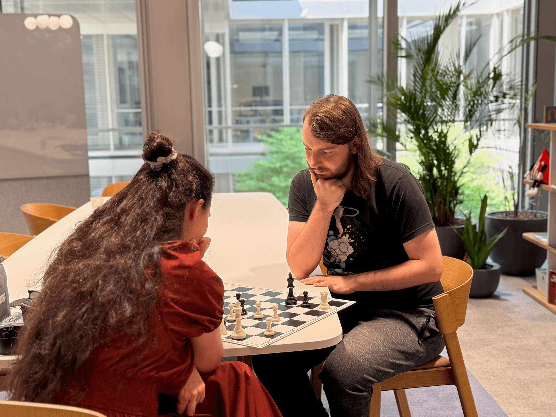 Two team members playing chess