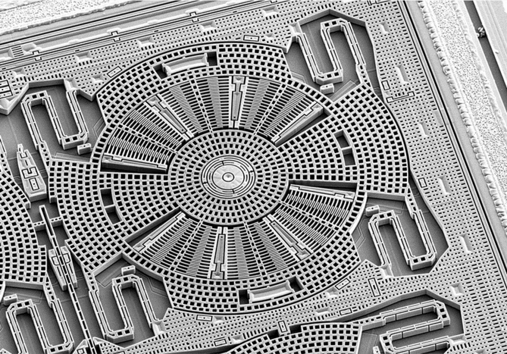 Close-up of a MEMS-based IMU component showing micro-scale mechanical elements for motion sensing.